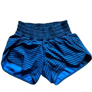 blue high waisted 4” inseam with zipper pocket